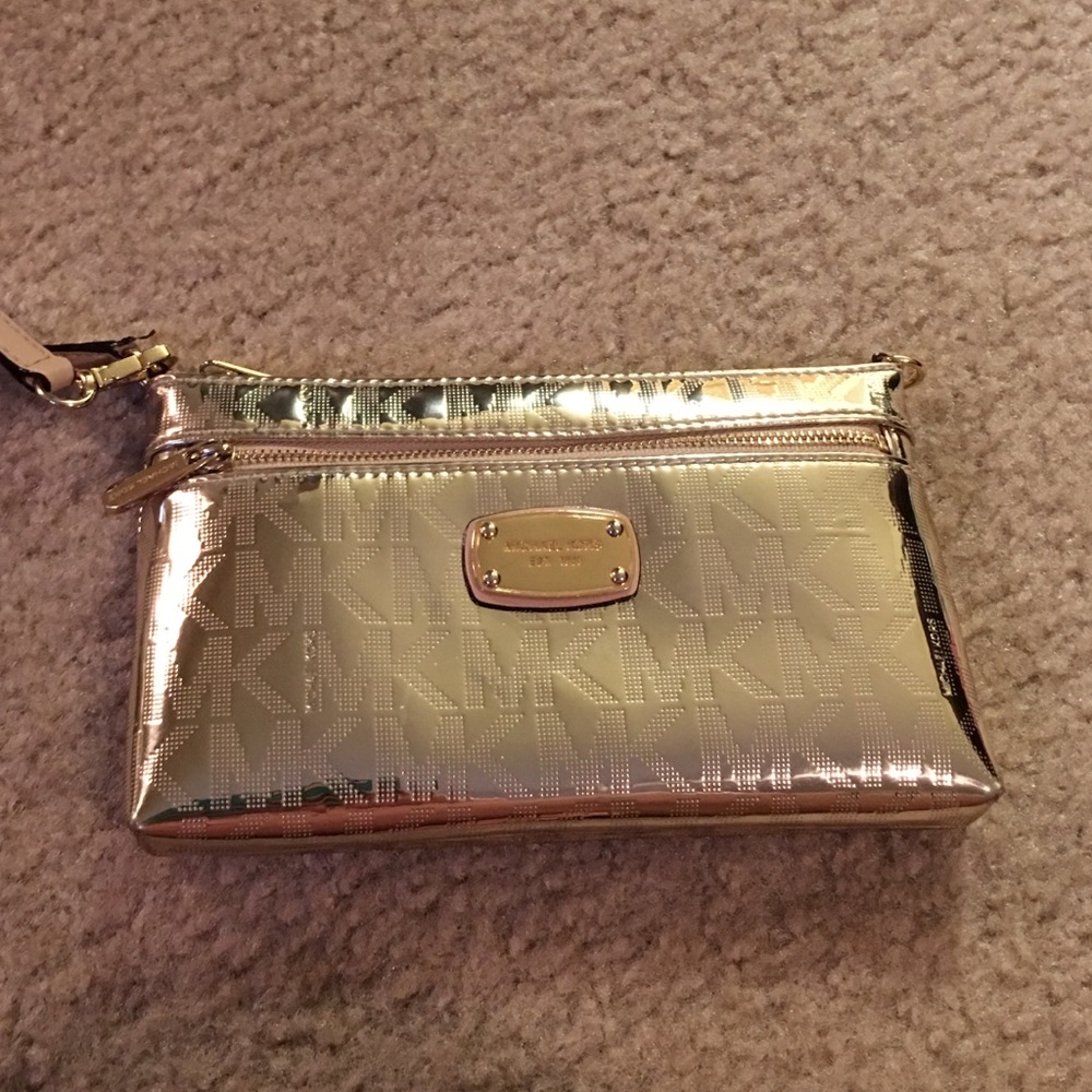 MK pale gold EUC wristlet